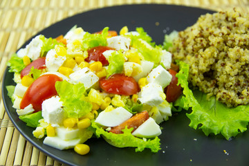 Vegetable salad with eggs, pickled cheese and quinoa