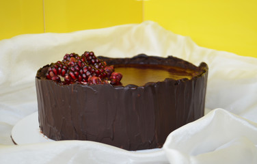Chocolate cake on a white tablecloth
