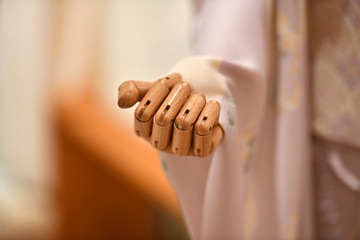 A wooden fist of a puppet. 