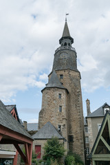 Fototapeta na wymiar historic clock tower in the old town center of Dinan in Brittany