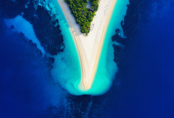 Croatia, Hvar island, Bol. Aerial view at the Zlatni Rat. Beach and sea from air. Famous place in Croatia. Summer seascape from drone. Travel - image - obrazy, fototapety, plakaty