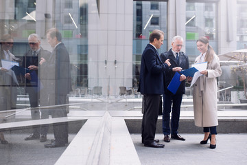 Businessmen that work together outdoors. concept of teamwork and partnership.