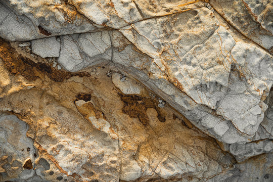 Close up shot of the rough sandstone rock on the coast at Yamba, New South Wales.