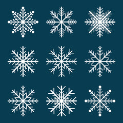 Set of snowflakes on blue background. Vector illustration