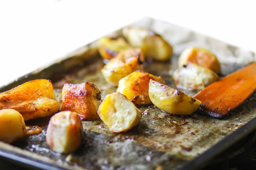 Roasted potatoes on iron pan