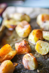 Roasted potatoes on iron pan
