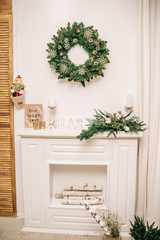 White Background for a photo studio with a Christmas wreath and fireplace