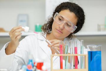 woman with a pipette in her hands