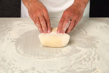 Making Puff Pastry. Bring dough to centre of butter to enclose it completely.