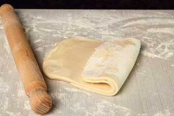 Making Puff Pastry. Folding lower third of dough over centre third and top third  down over that....