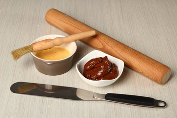 Rolling Pin, Palette Knife, Chocolate, Egg Glaze, Brush. Making Chocolate Croissants with Puff Pastry