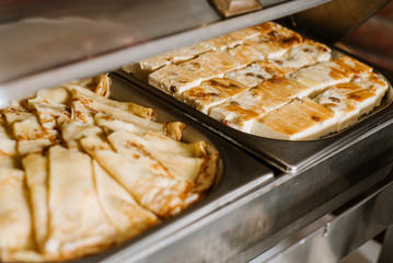 Cheese cake and pancake in bowl on the buffet table