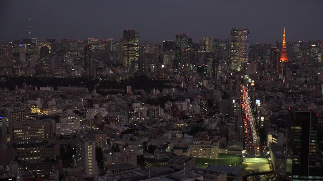 TOKYO, JAPAN -NOVEMBER 2019 : Aerial high angle view of cityscape of TOKYO at night. Scenery of central downtown area and business district. Concept of Japanese metropolis and city. View from Shibuya.
