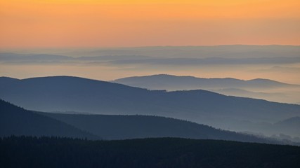 Beautiful landscape and sunset in the mountains. Hills in clouds. Jeseniky - Czech Republic - Europe.