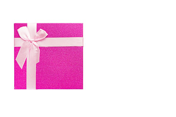 Red gift box with pink ribbon isolated on white background. Clipping path included.