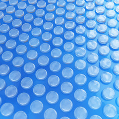 render of bubble plastic on a blue background