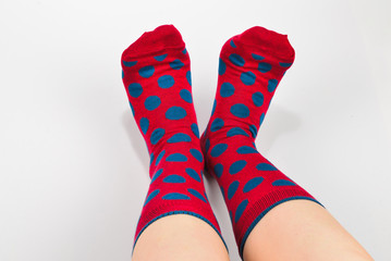 Woman in red socks isolated on white background. Top view.