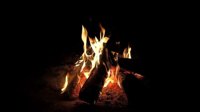 Burning fire at night, campfire bonfire in slow motion