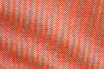 Orange strand weave texture background.