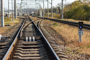Fototapeta na wymiar Railway rails close up, going far forward.