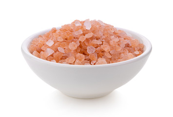 Himalayan salt raw crystals in white  bowl Isolated on white background