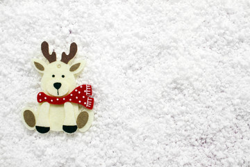 Christmas white reindeer decoration on white. New Year greetings background