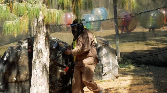 Paintball the game takes place in a dramatic forested arena n the Drakensburg