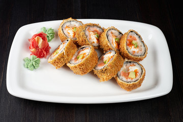 Sushi Roll with salmon on a plate