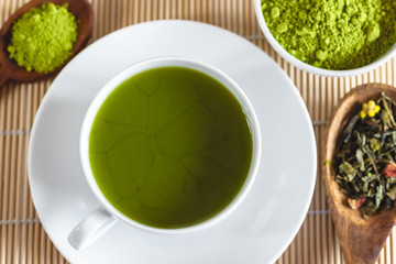Green tea matcha in a white cup