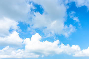 Nature Bright blue Sky with white clouds on blackground. Beautiful sky and clouds in the afternoon.