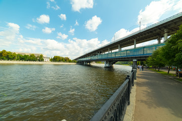 Fototapeta na wymiar Moscow River Embankment - Sparrow Hills,Metro bridge with art. metro Vorobyovy Gory.
