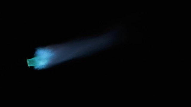 Slow motion. Intense gas jet flame of a gas burner. Smooth increase and decrease of a single stream of flame.