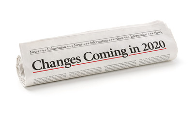 Rolled newspaper with the headline Changes coming in 2020