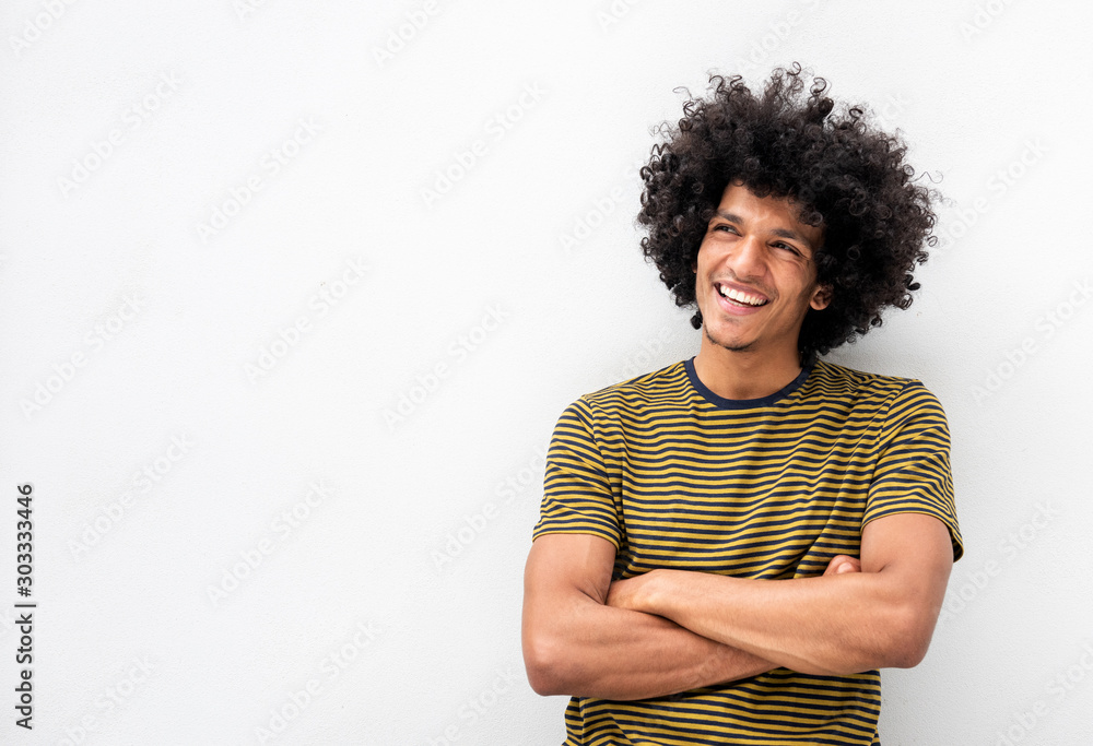 Poster young handsome man with afro hair smiling with arms crossed by white background