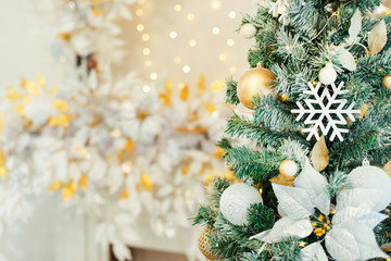 Fototapeta na wymiar Beautiful Christmas tree with festive decor on dark background. Space for text
