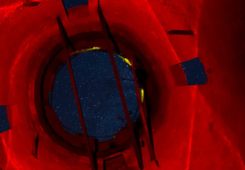 View of the starry sky through opening of the water tower. Stars
