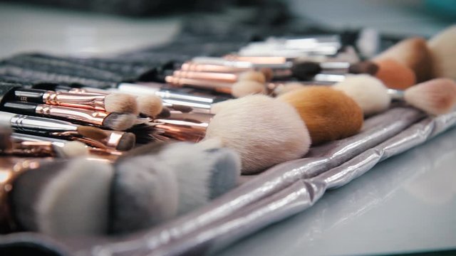 Used makeup brushes in backstage of the fashion show. Selective focus