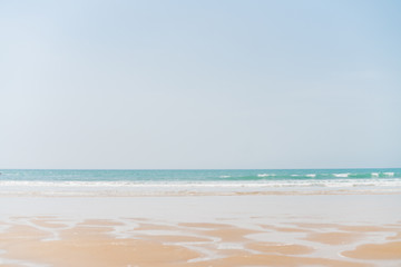 Fototapeta na wymiar landscape sea and sea sand, deserted beach, puddles spread along the shore