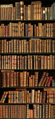 old books on wooden shelf