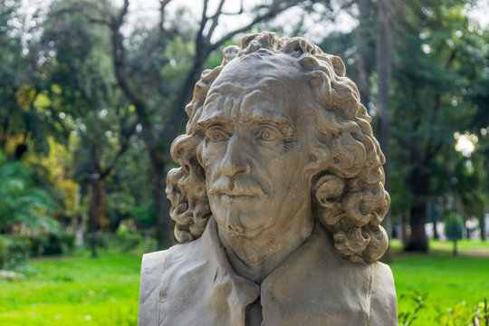 Old marble bust of Gian Lorenzo Bernini in the public park Pincian Hill, Villa Borghese gardens, Rome, Italy