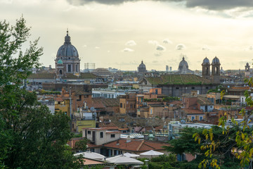 Fototapeta na wymiar panorama of Rome with the dome of San Carlo al Corso in the backgroundf rom the public park Pincian Hill, Villa Borghese gardens, Rome, Italy