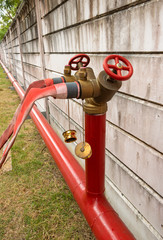 Red fire hose. Water pipes around the fence around the factory. In the event of a fire occurs, fire hose can be used immediately. To prevent a lot of potential losses in the future.