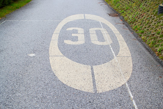 Road sign. Speed 30 km per hour.