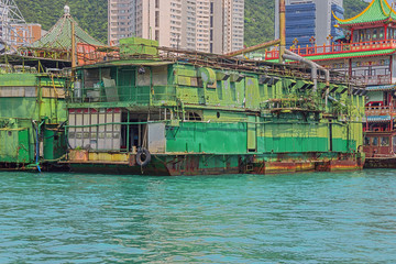 Fototapeta na wymiar Backside of a floating island in the harbor of Aberdeen in Hong Kong