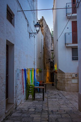 Evening winter on the streets of Polignano a Mare Old Town, Bari Province, Puglia region, southern Italy.