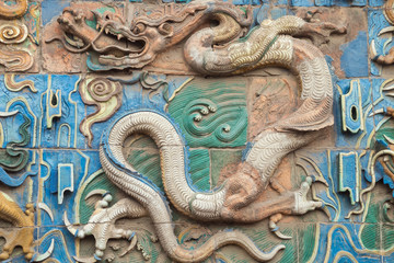 Close up of the brown dragon on the nine dragon wall in the old town of Pingyao