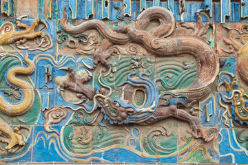Brown dragon on the nine dragon wall in the old town of Pingyao