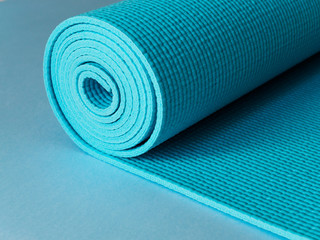 Blue Mat for yoga, fitness or Pilates in the gym