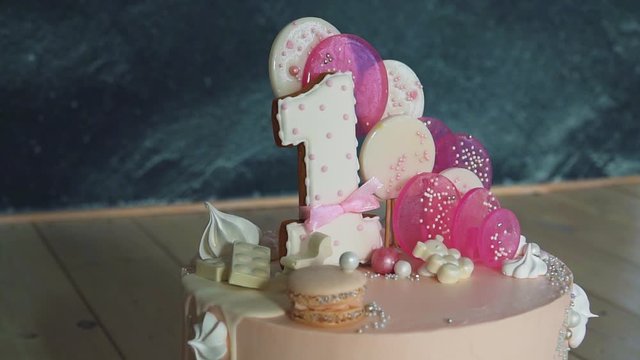 beautiful delicious decorated cake with the number one