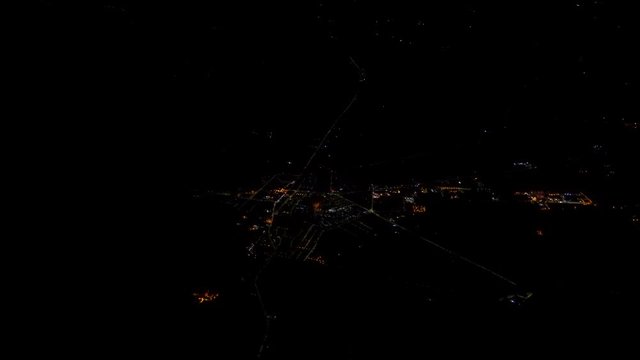 European city at night. View from the plane.